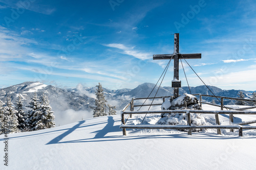 summit cross at "Hochanger" mountain near the city Bruck an der Mur in Styria, Austria in winter
