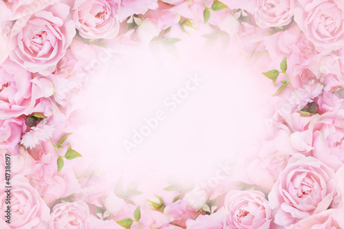 Delicate blossoming pink rose frame, blooming flowers pastel festive background, soft bouquet floral card, toned  © ulada