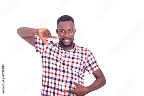 handsome serious adult man making a frame with his fingers.