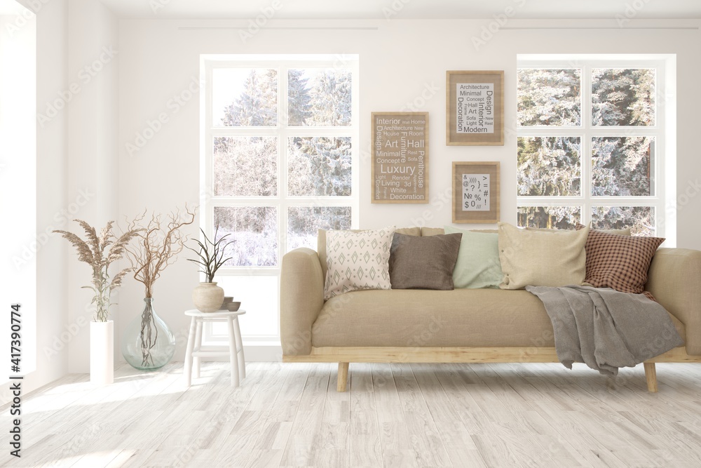 Fototapeta premium White living room with sofa and winter landscape in window. Scandinavian interior design. 3D illustration