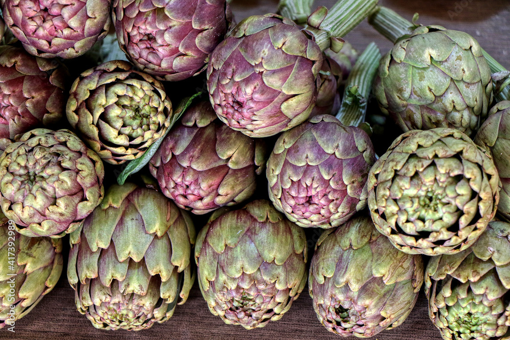 Fototapeta premium Close up of various artichokes sold in a greengrocer