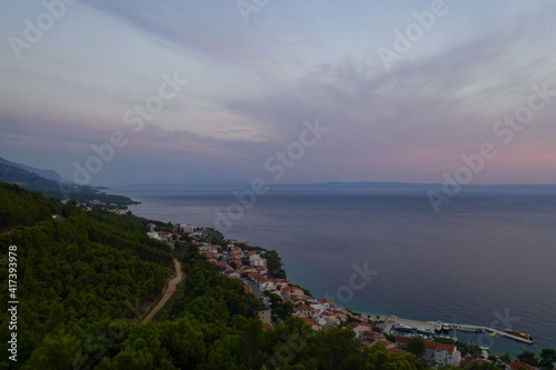 Famous Adriatic coast. Aerial evening view of picturesque coastline in Makarska riviera, Brela, Croatia, Europe. Splendid Adriatic sea, mountains and a village by the sea. Breathtaking landscapes. © MONIUK ANDRII