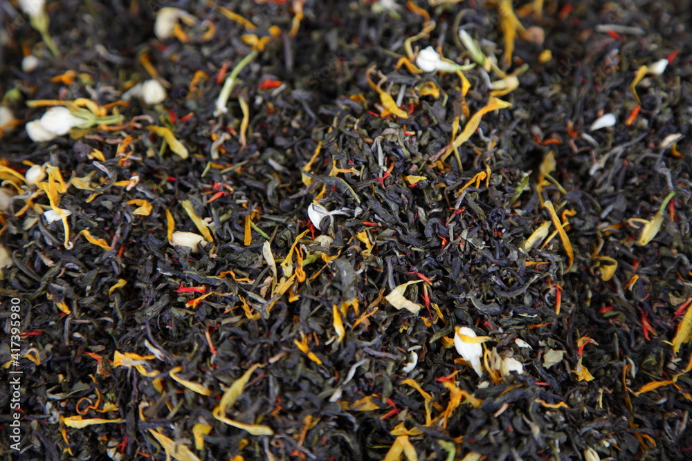 Dried black grey fruit tea mix background texture, natural ingredient for food cooking