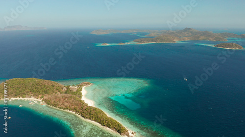 aerial view tropical islands and the blue sea. Palawan, Philippines. Islands of the Malayan archipelago with turquoise lagoons.