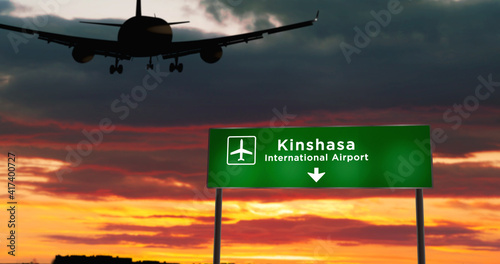 Plane landing in Kinshasa Congo airport with signboard
