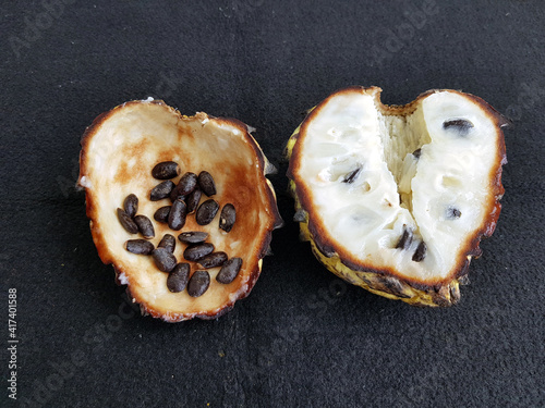 Whole, opened, and seeds Rollinia deliciosa, is a species of flowering plant in the custard-apple family, that is native to tropical South America. Annonaceae family. photo