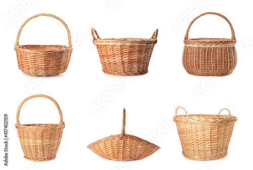 Set with different wicker baskets on white background