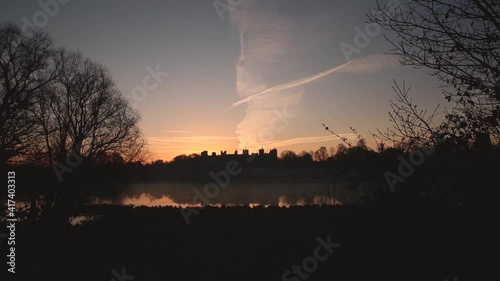 The silhouette of Framlingham Castle at dawn in Suffolk, UK photo