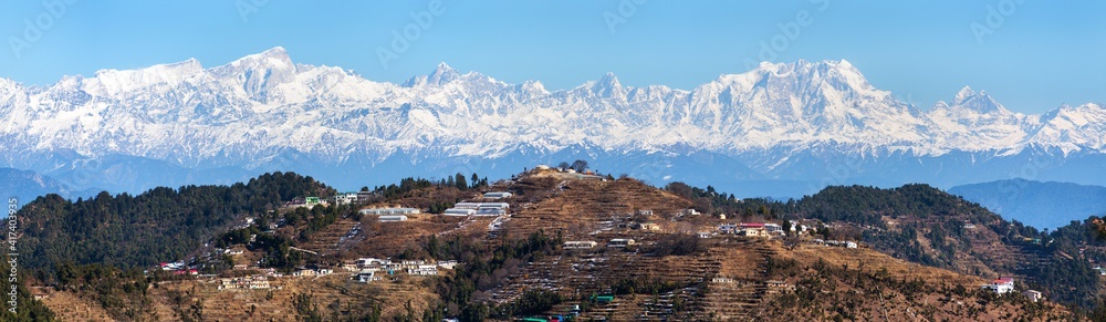 Mount Chaukhamba village and terraced fields Himalaya
