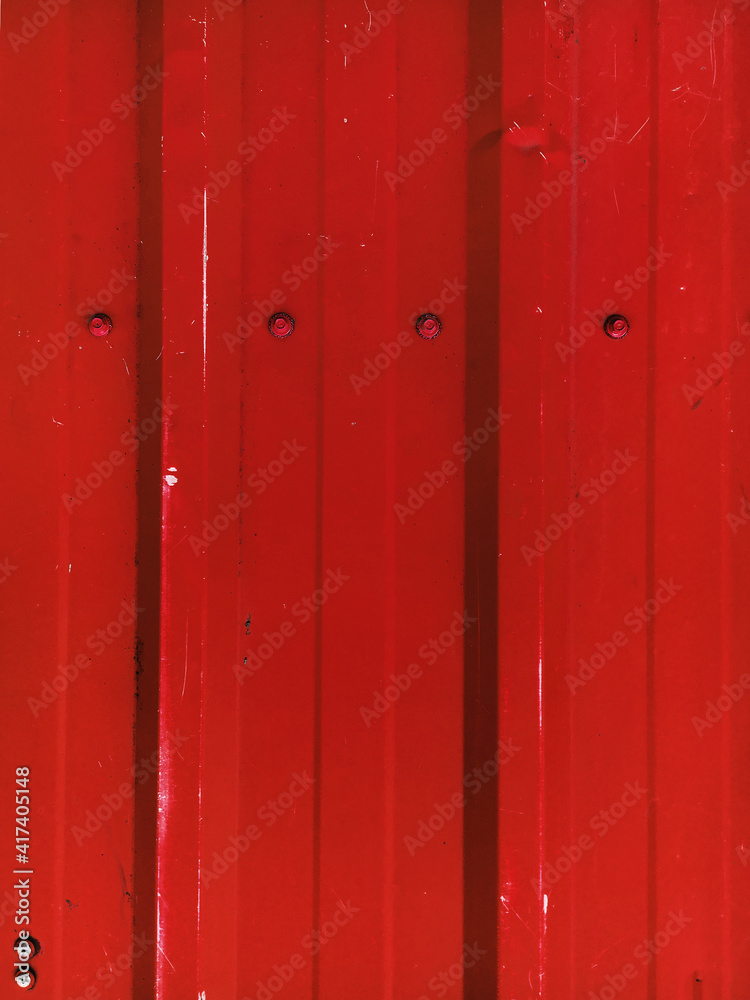 Fototapeta premium Blue rippled metal texture with bolts