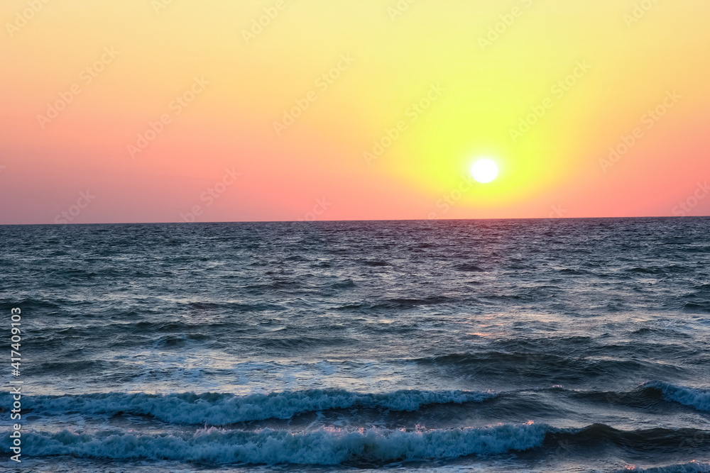 A Beautiful sunset with sea reflection background travel
