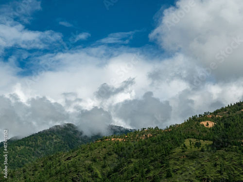 clouds over the mountains in Paro  Bhutan