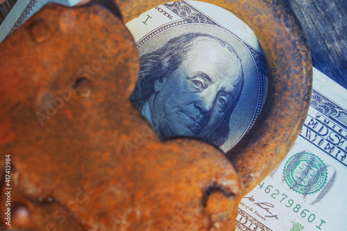 Wallpaper Mural Close up image of US Dollar bill with reliable metal lock as symbol of security for money, trade and business. Torontodigital.ca