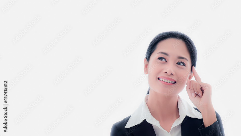 Close-up portrait of Asian businesswoman, long hair in a black suit, looks smart and young girl, aged 25-30 years, is using the ideas and answers that are needed. Made her smile with confidence Close-up portrait of Asian businesswoman, long hair in a black suit, looks smart and young girl, aged 25-30 years, is using the ideas and answers that are needed. Made her smile with confidence