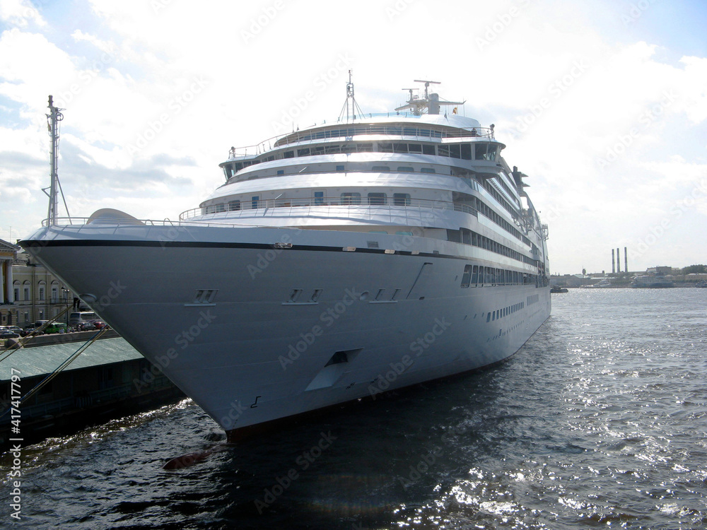 Cruise ship at the city pier on the Neva River in St. Petersburg