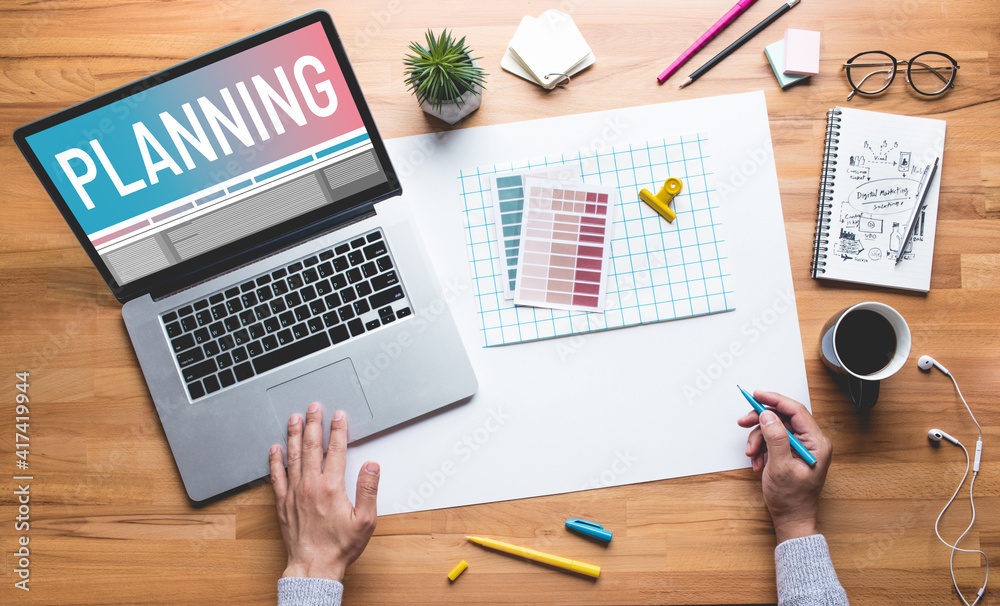 Planning concepts with top view of person work on desk table Planning concepts with top view of person work on desk table