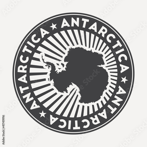 Antarctica round logo. Vintage travel badge with the circular name and map of country, vector illustration. Can be used as insignia, logotype, label, sticker or badge of the Antarctica.
