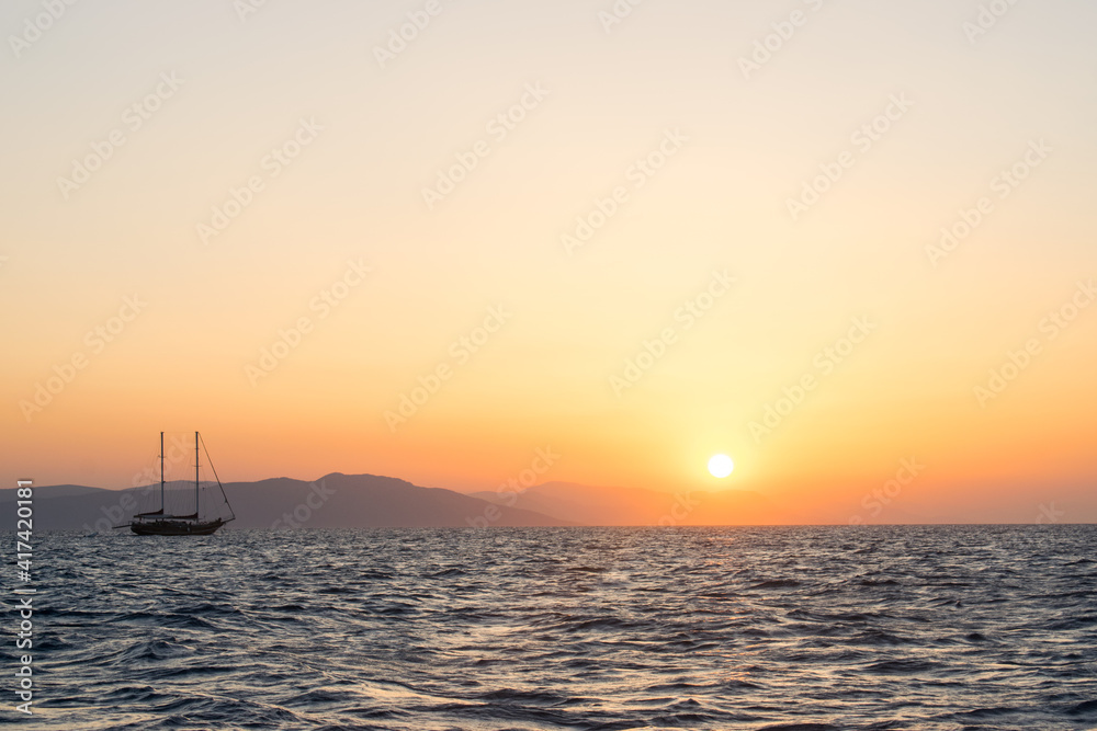 sailboat at sunrise sailboat at sunrise