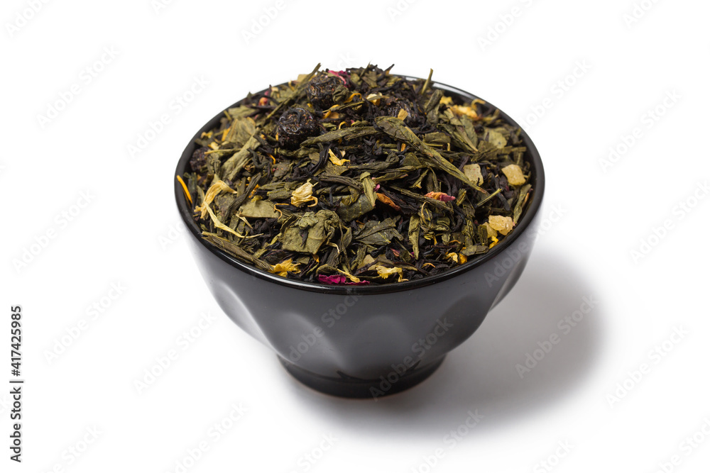 Fototapeta premium Green tea with jasmine flowers on black background