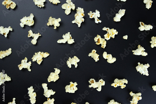 Background, texture of caramel popcorn on a black background