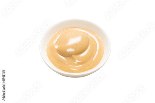 Mushroom sauce in a bowl isolated on white background.