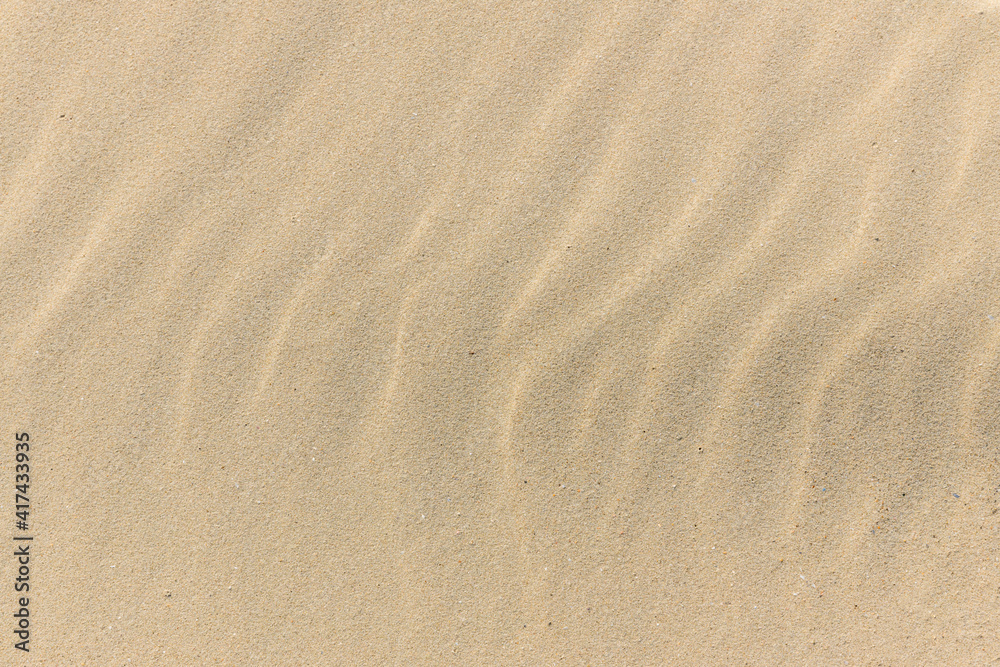 Natural sand stone texture background. sand on the beach as background. Wavy sand background for summer designs. Natural sand stone texture background. sand on the beach as background. Wavy sand background for summer designs.