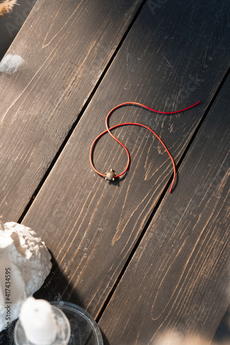 Red ribbon with love on hand, bracelet