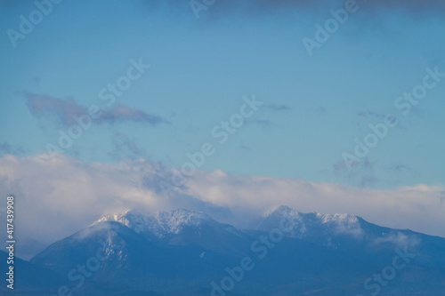 The Olympic mountains of Washington State with Puget Sound in the foreground.