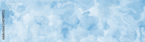 Fototapeta Naklejka Na Ścianę i Meble -  Pastel light blue watercolor painted background, blotches and blobs of paint and watercolor paper texture grain, abstract blue painting