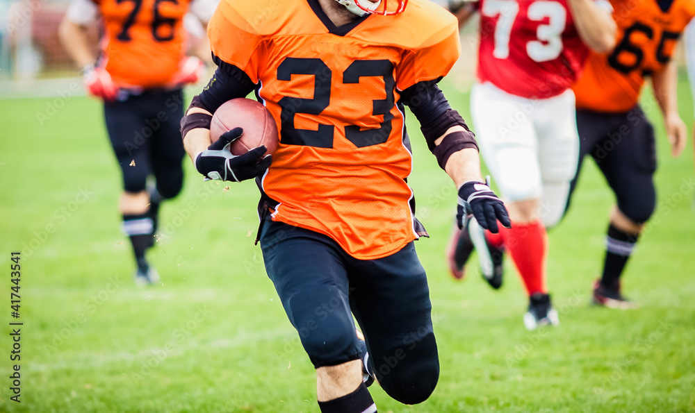 american football players during a game american football players during a game