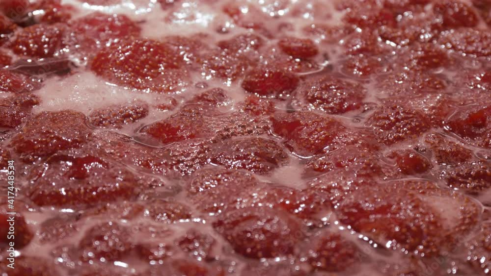 TIME LAPSE: Strawberry jam. Make a strawberry jam. Boil strawberries in the pan. Process of cooking, boiling berries for canning. Healthy sweet food. Cooking strawberry jam close up. TIME LAPSE: Strawberry jam. Make a strawberry jam. Boil strawberries in the pan. Process of cooking, boiling berries for canning. Healthy sweet food. Cooking strawberry jam close up.
