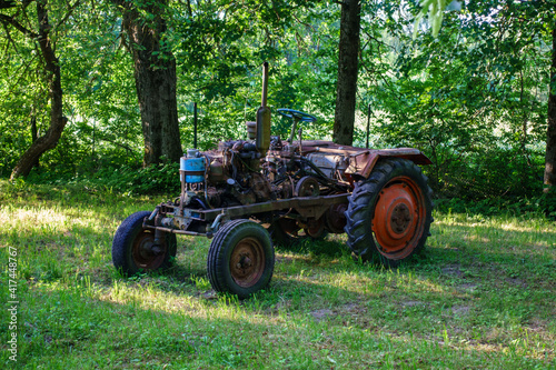 old broken tractor in the field