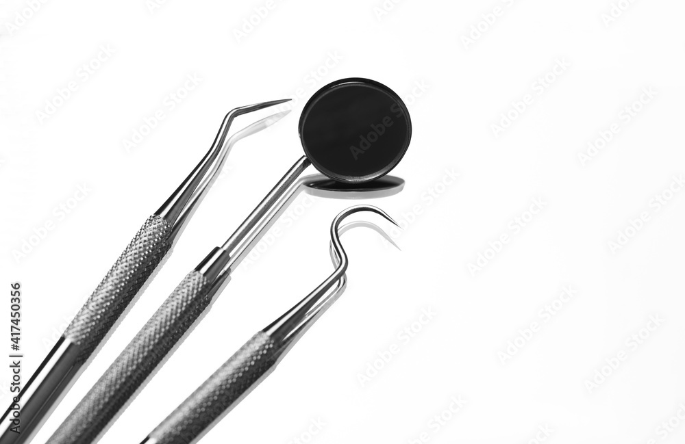 Dental tools on white background. Medical technology concept. Dental hygiene. Cure concept. Dentist tools. Dental equipment. Dental tools on white background. Medical technology concept. Dental hygiene. Cure concept. Dentist tools. Dental equipment.