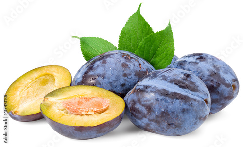 fresh plum fruit with green leaf and cut plum slices isolated on white background. Clipping path
