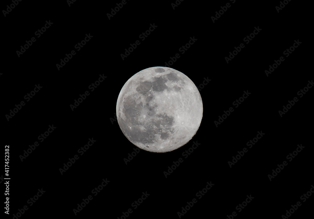 Fototapeta premium The moon phase Waxing Gibbous a day before Full Moon on 26th February 2021