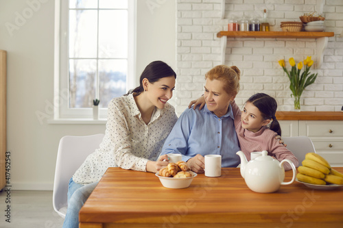 Принти на полотні Three generations of one family spending time at home