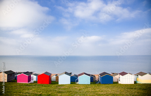 row of beach huts in Tankerton near Whitstable in Kent - British summer photo