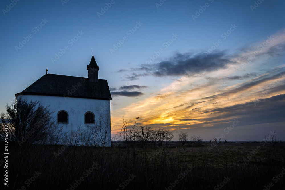 Small Chapel at sunrise in Burgenland near oggau