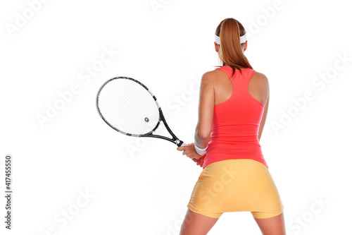 Tennis player with racket in blue costume. Woman athlete playing isolated on white background.