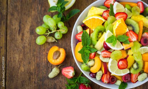 Healthy fresh fruit salad in the bowl © pilipphoto