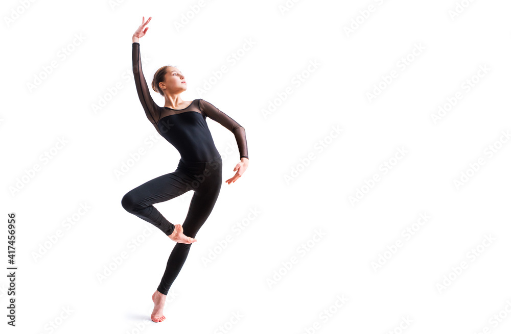 a ballet girl in a black tight-fitting suit dances on a white background with modern contemporary choreography