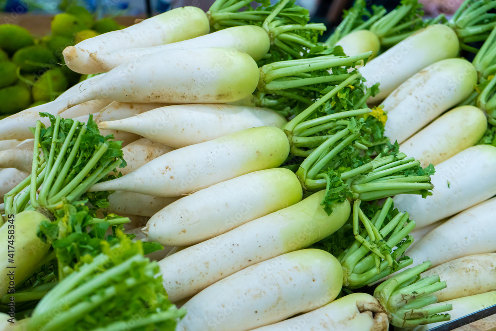 A radish counter in the grocery store's vegetable section A radish counter in the grocery store's vegetable section