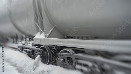 tanks on railway tracks, fragment, monochrome, blurred image