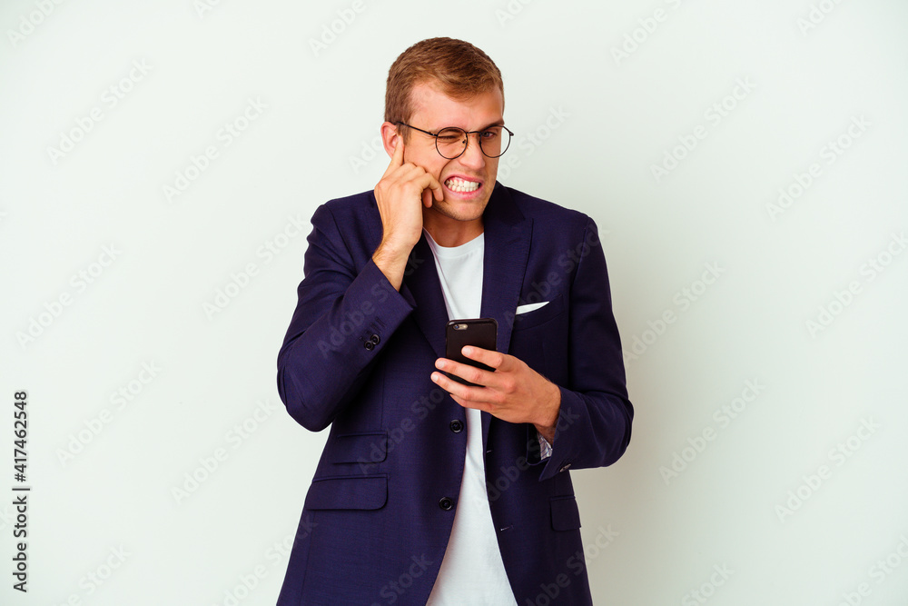Young business man holding a phone isolated on white background Young business man holding a phone isolated on white background