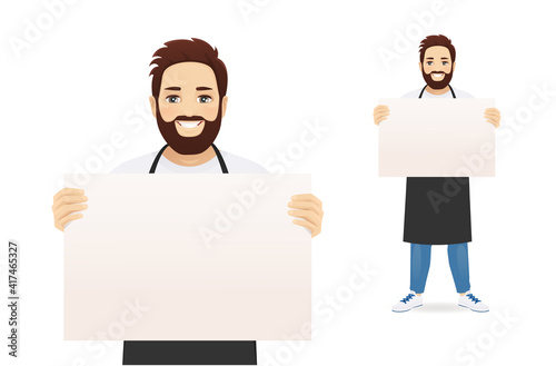Handsome man in black apron presenting something holding empty blank board or paper isolated vector illustration