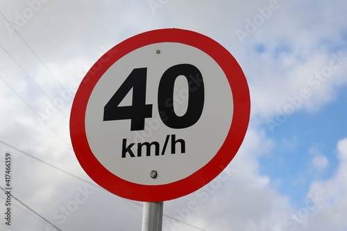 40km limit traffic sign on the road. 40km/h speed limit sign. 
