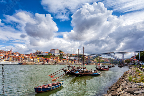 Oporto, Portugal, Europe. Postcard from the picturesque city of Porto, amazing travel destination in Portugal. View to the historic center, Douro River with its beautiful bridge and old monuments.