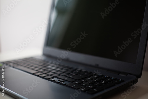 A blur keyboard and notebook 