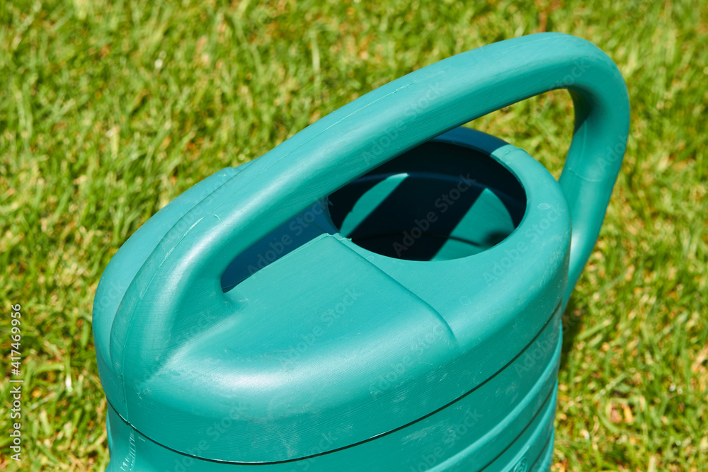 watering can garden from above,watering can with handle close up top view watering can garden from above,watering can with handle close up top view