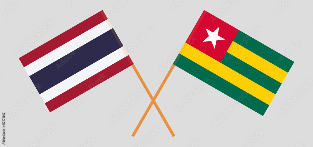 Crossed flags of Thailand and Togo. Official colors. Correct proportion
